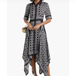 M

SIMKHAI
Abrielle printed TENCEL™ and silk-blend maxi shirt dress